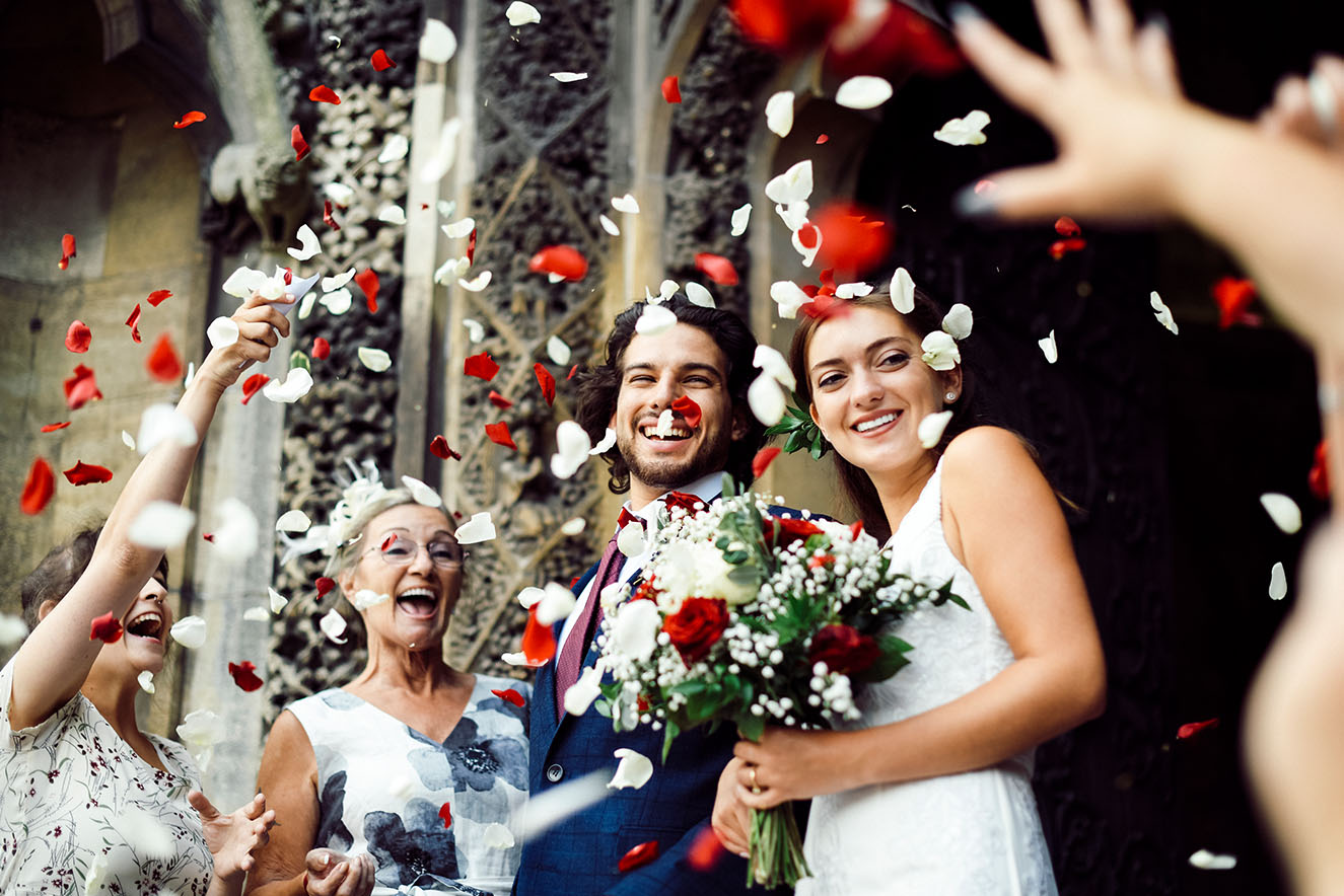 family-throwing-rose-petals-at-the-newly-wed-bride-2022-12-16-00-29-33-utc.jpg